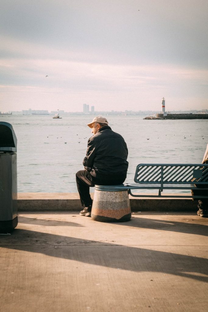 man relaxing in harbor